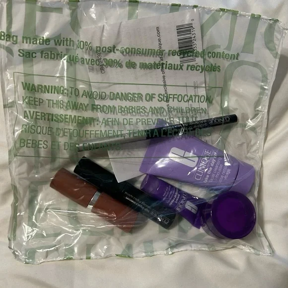 Clinique Floral Cosmetic Bag with Lipstick, Eye Pencil, Mascara, Wrinkle Creams - Picture 3 of 4